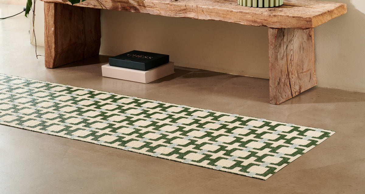 Tom Leaf Runner Rug by Pappelina, showing tom leaf runner rug in live shot.