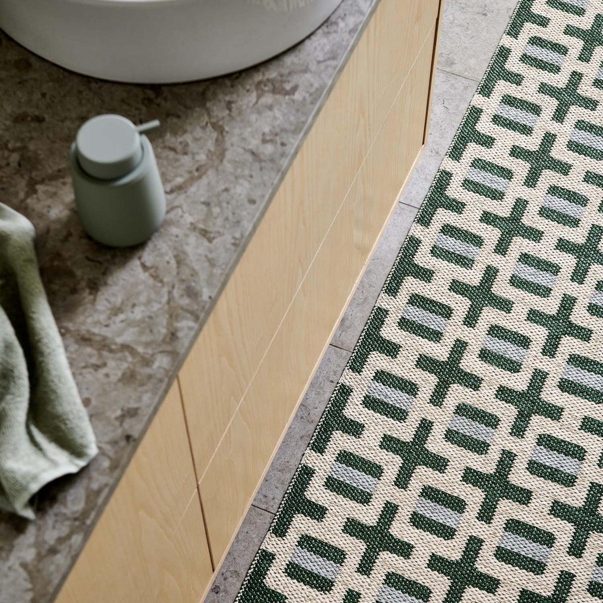 Tom Leaf Runner Rug by Pappelina, showing tom leaf runner rug in live shot.