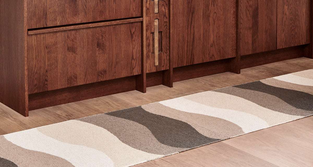 Urvi Earth Runner Rug by Pappelina, showing urvi earth runner rug in live shot.