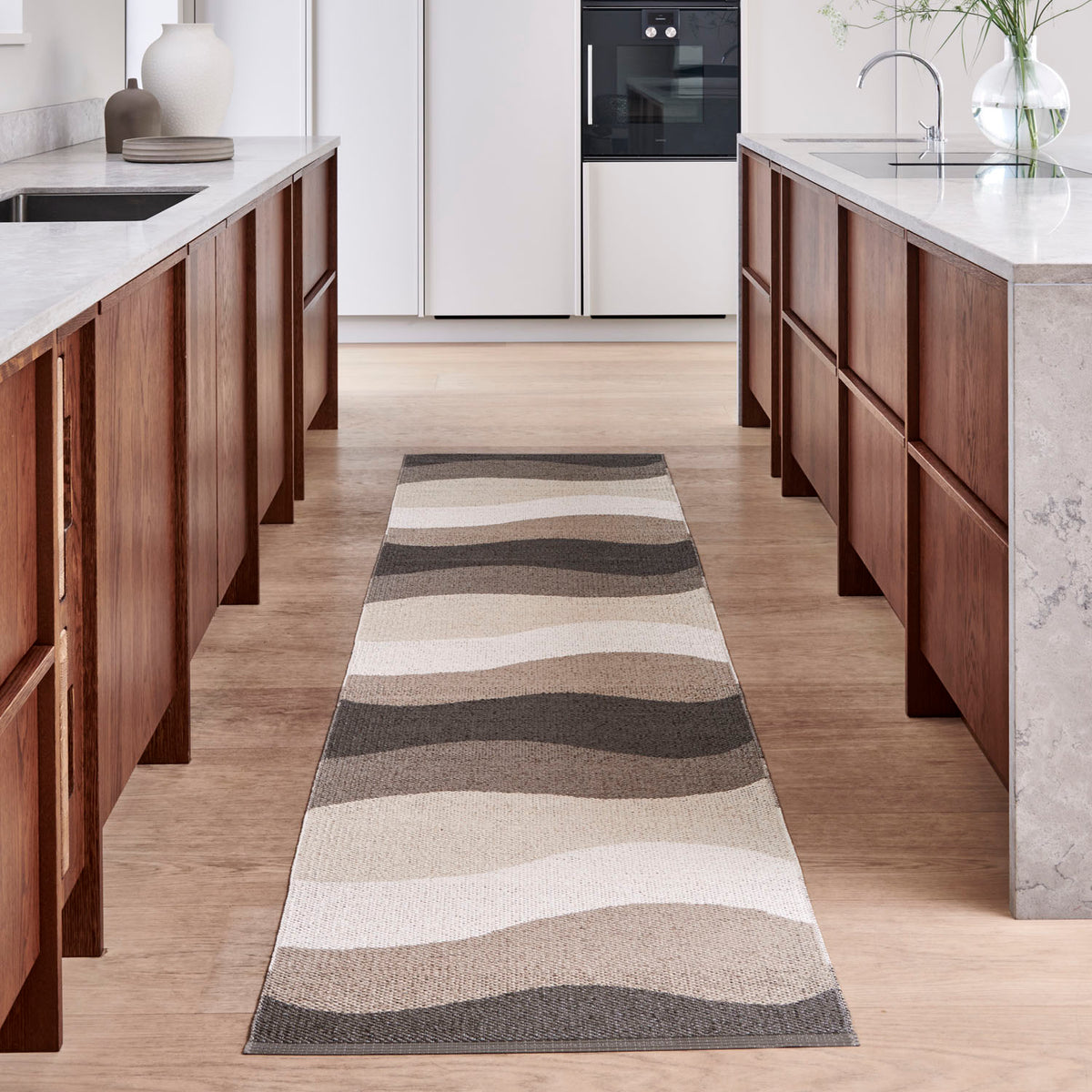 Urvi Earth Runner Rug by Pappelina, showing urvi earth runner rug in live shot.