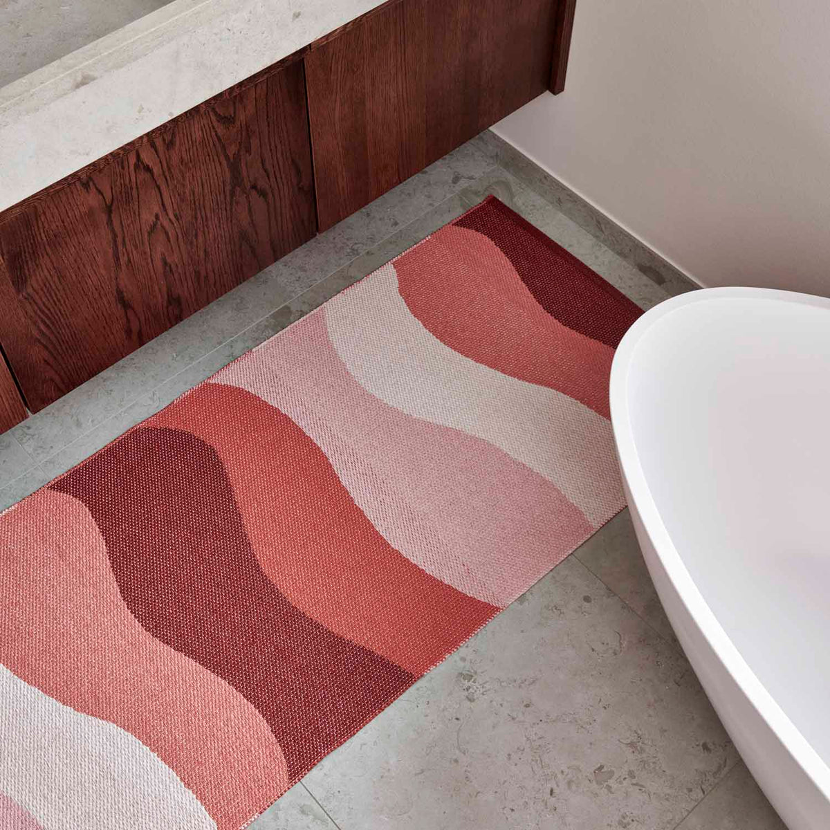 Urvi Fire Runner Rug by Pappelina, showing urvi fire runner rug in live shot.