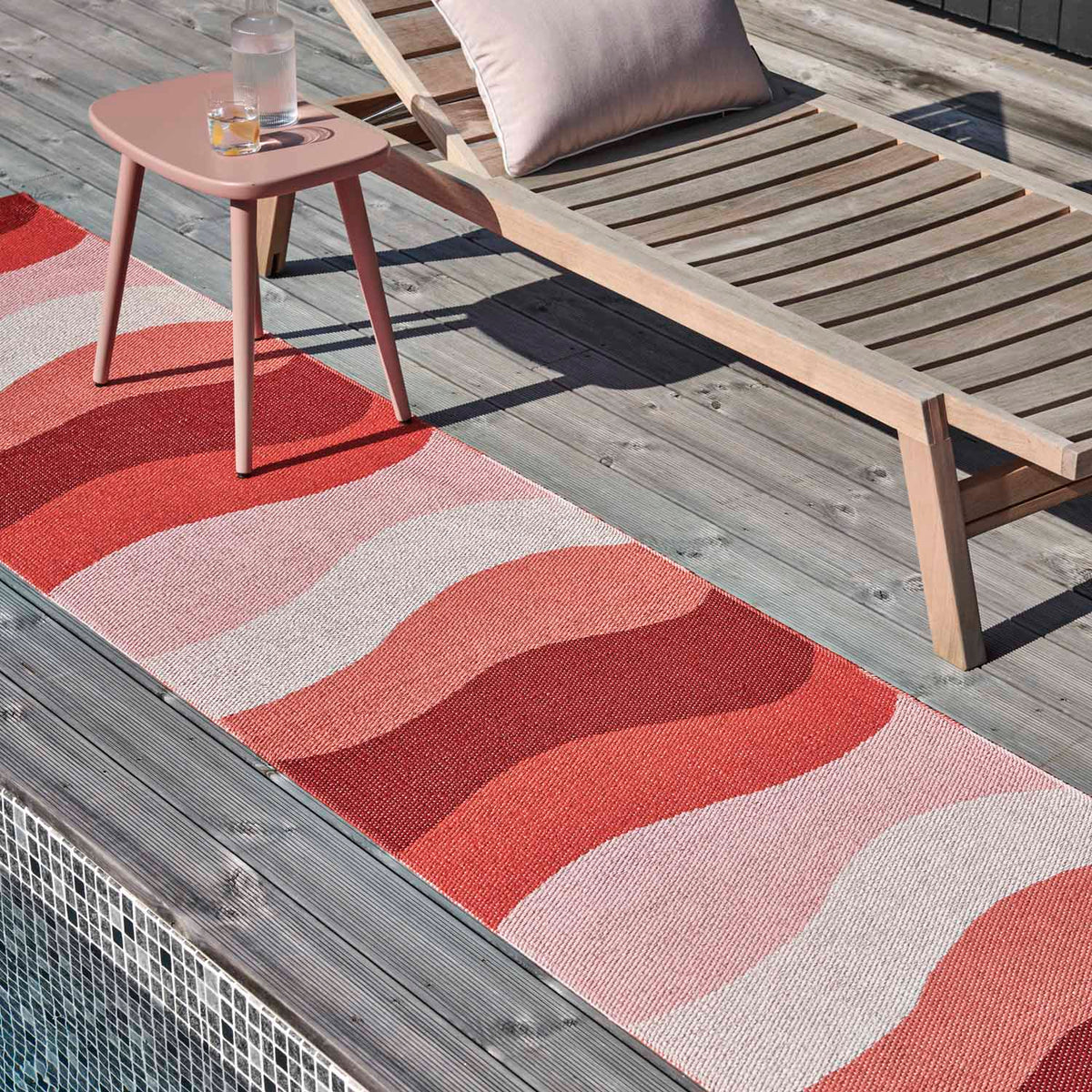 Urvi Fire Runner Rug by Pappelina, showing urvi fire runner rug in live shot.