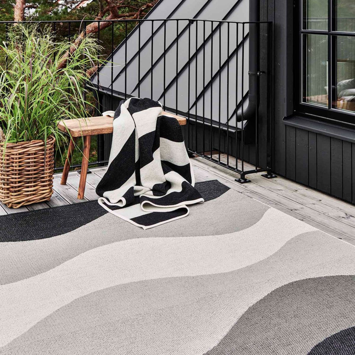 Urvi Metal Runner Rug by Pappelina, showing urvi metal runner rug in live shot.