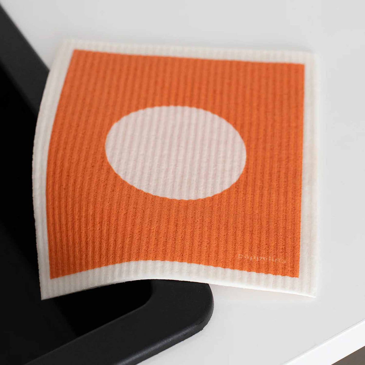 VERA POP Dish Cloth by Pappelina, showing vera pop dish cloth in live shot.