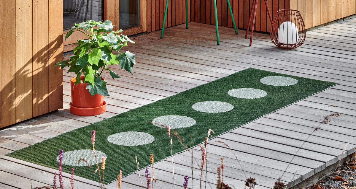 Vera Pop Leaf Runner Rug by Pappelina, showing vera pop leaf runner rug in live shot.