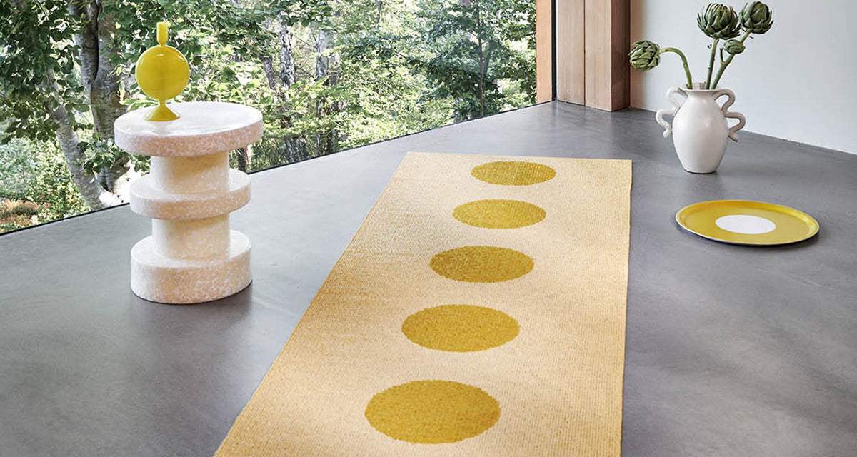 Vera Pop Mustard Runner Rug by Pappelina, showing vera pop mustard runner rug in live shot.