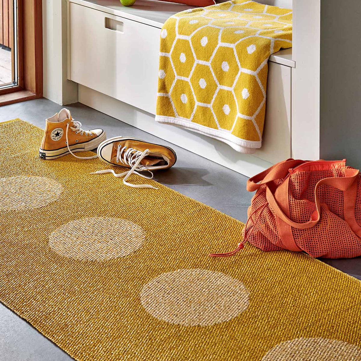 Vera Pop Mustard Runner Rug by Pappelina, showing vera pop mustard runner rug in live shot.