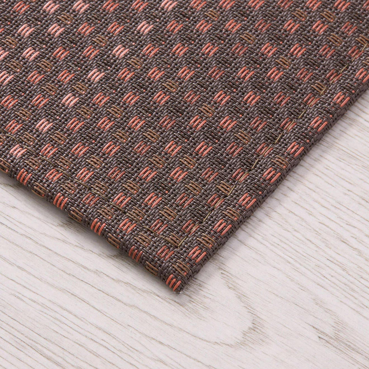 Parade Floor Mat by Chilewich, showing closeup view of parade floor mat in live shot.