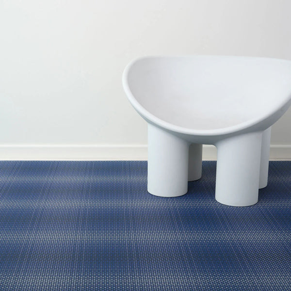 Parade Floor Mat by Chilewich, showing closeup view of parade floor mat in live shot.