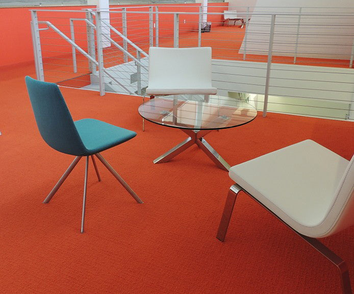 Pera Chair by B&T, showing pera chairs in live shot.