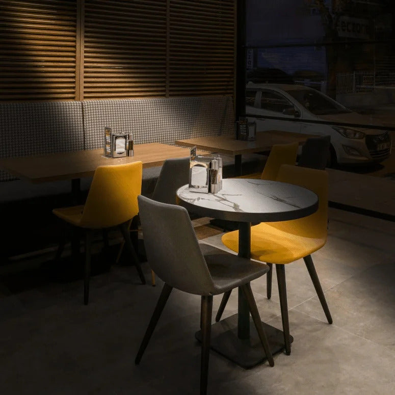 Pera Dowel Wood Chair by B&T, showing pera dowel wood chairs in live shot.