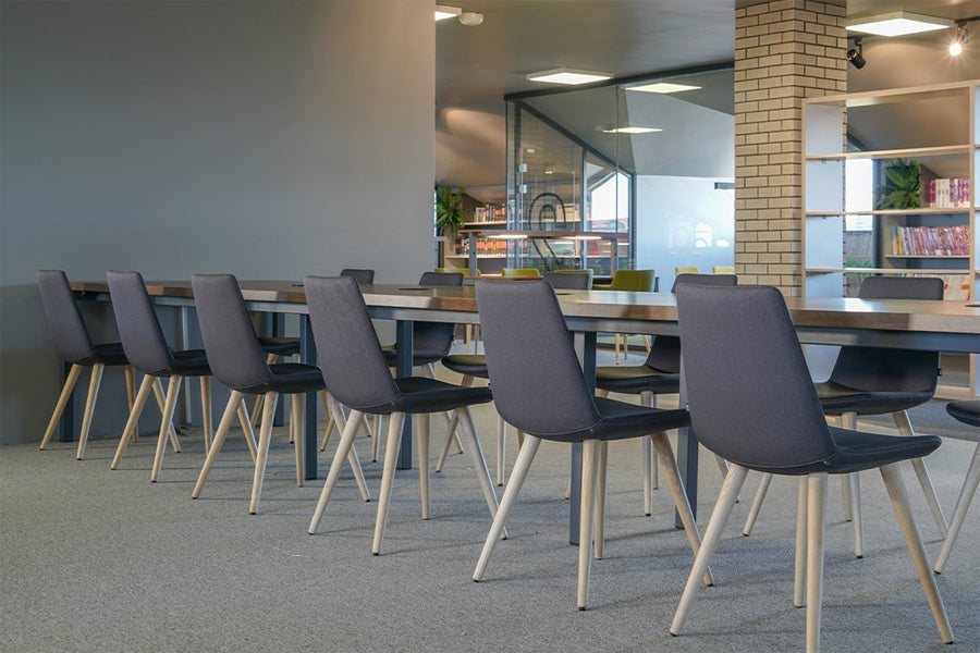 Pera Dowel Wood Chair by B&T, showing pera dowel wood chairs in live shot.