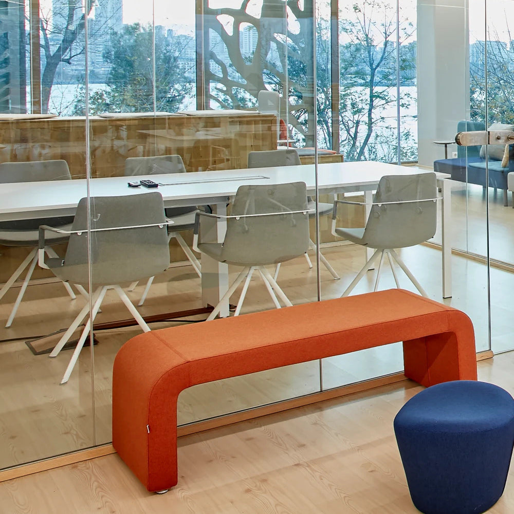 Pera Ellipse Swivel Armchair by B&T, showing pera ellipse swivel armchairs in live shot.