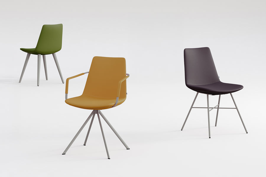 Pera Ellipse Swivel Armchair by B&T, showing pera ellipse swivel armchair in live shot.