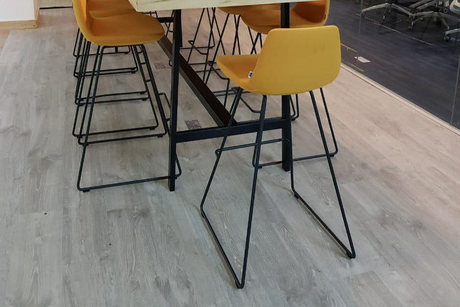 Pera Sled Stool by B&T, showing pera sled stools in live shot.