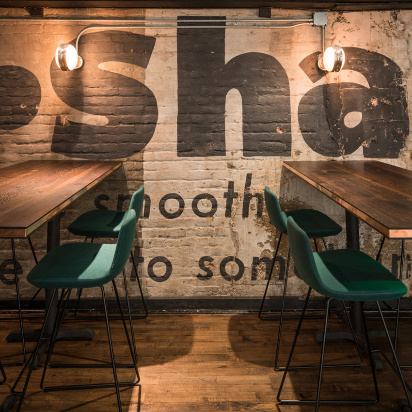 Pera Sled Stool by B&T, showing pera sled stools in live shot.