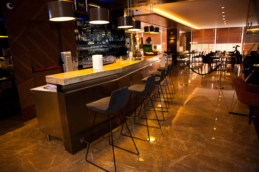 Pera Sled Stool by B&T, showing pera sled stools in live shot.