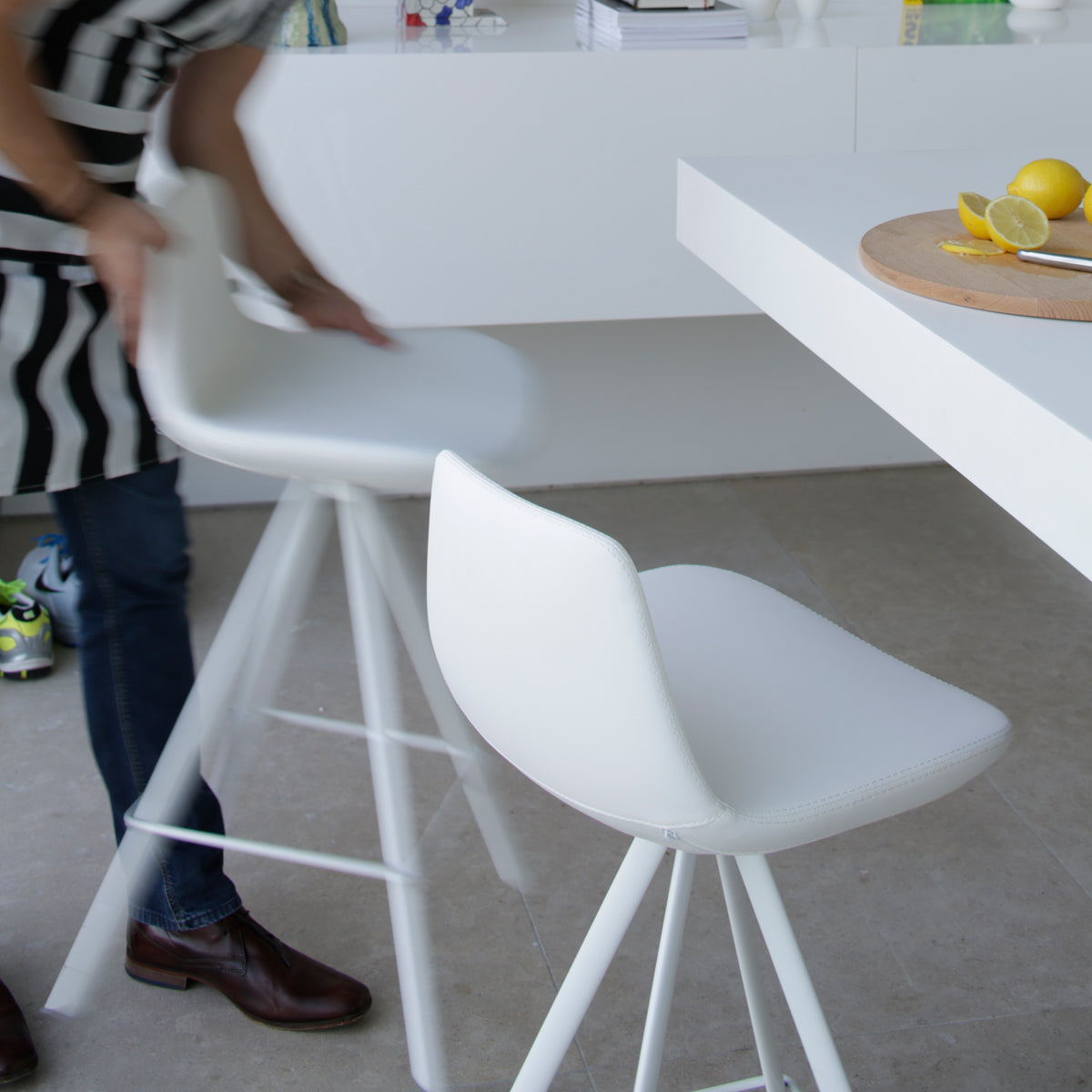 Pera Stool by B&T, showing closeup view of pera stools in live shot.