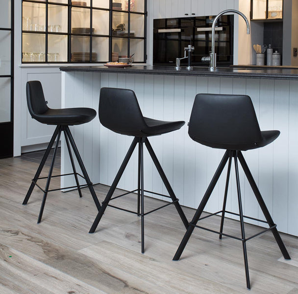 Pera Stool by B&T, showing pera stools in live shot.