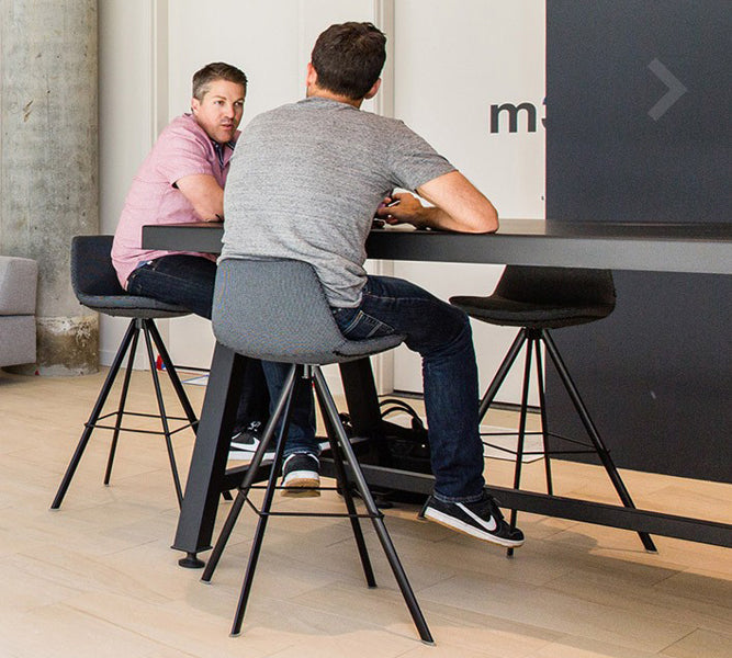 Pera Stool by B&T, showing pera stools in live shot.