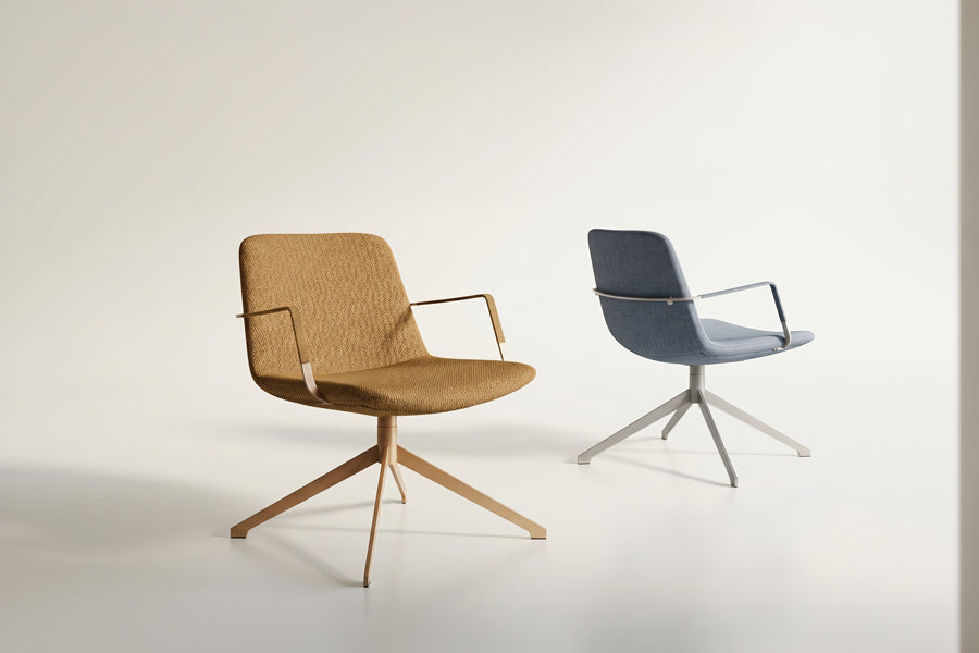 Pera Swivel Lounge Chair by B&T, showing pera swivel lounge chairs in live shot.