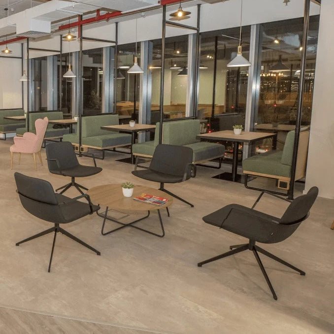Pera Swivel Lounge Chair by B&T, showing pera swivel lounge chairs in live shot.