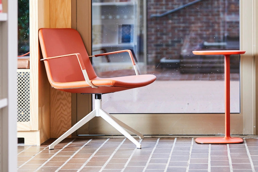 Pera Swivel Lounge Chair by B&T, showing pera swivel lounge chair in live shot.