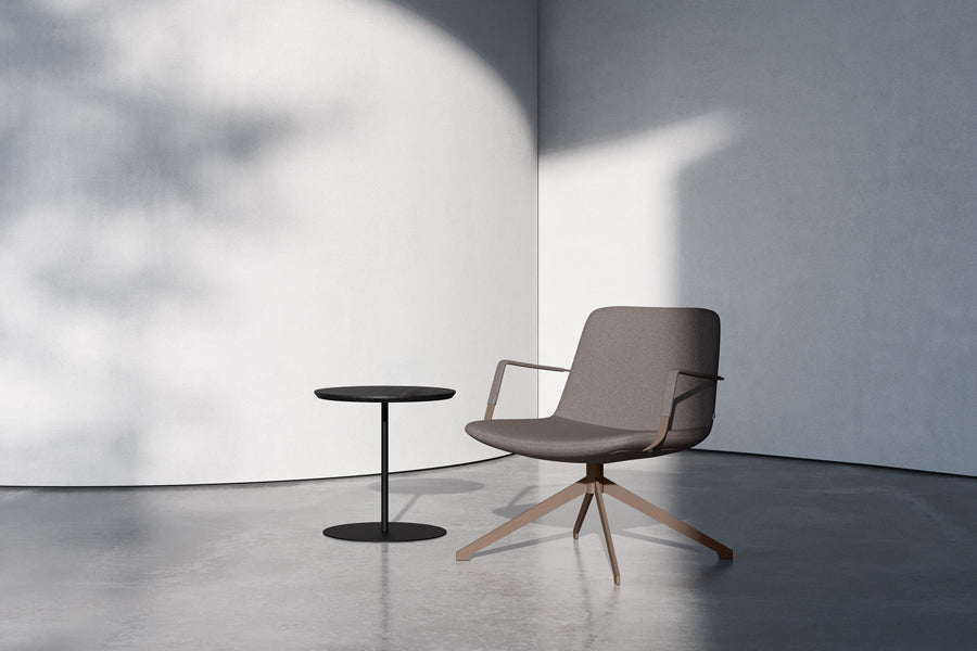 Pera Swivel Lounge Chair by B&T, showing pera swivel lounge chair in live shot.