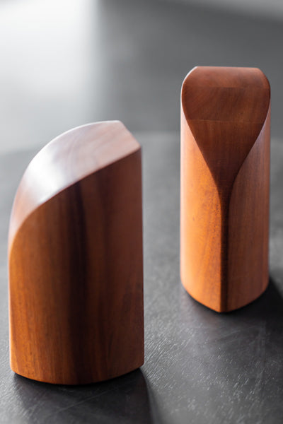 PI Book Ends by Ethnicraft, showing pi book ends in live shot.