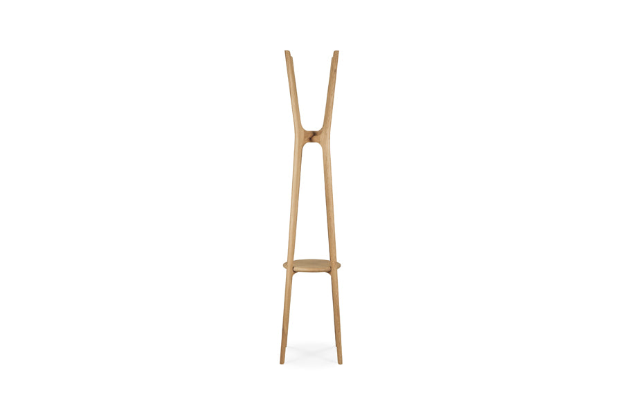 PI Coat Accessory by Ethnicraft, showing side view of pi coat accessory in stand/oak.