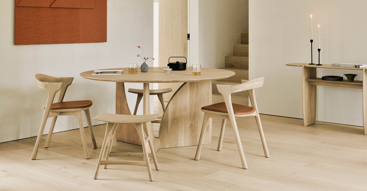 PI Dining Chair by Ethnicraft, showing pi dining chairs in live shot.