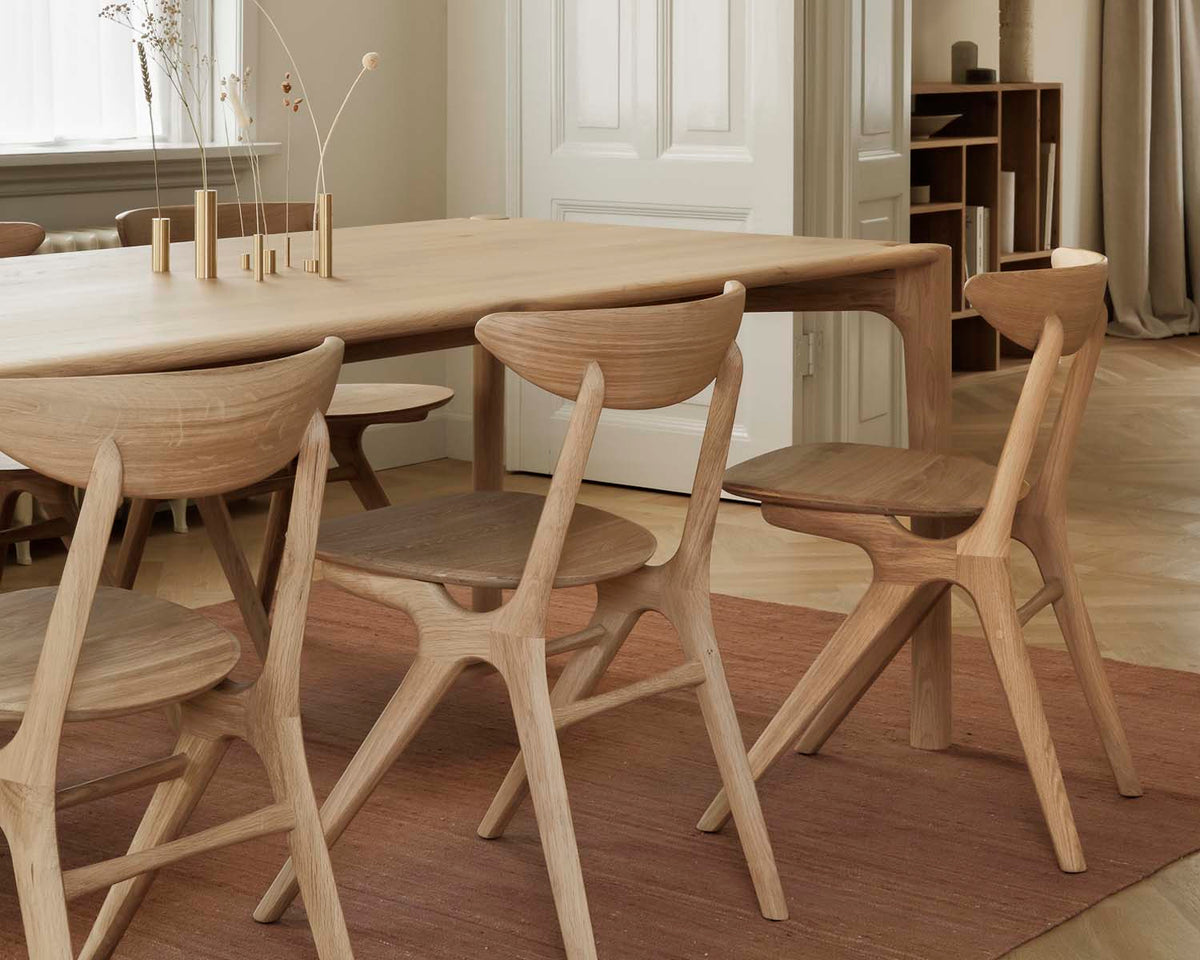 PI Dining Table by Ethnicraft, showing pi dining table in live shot.