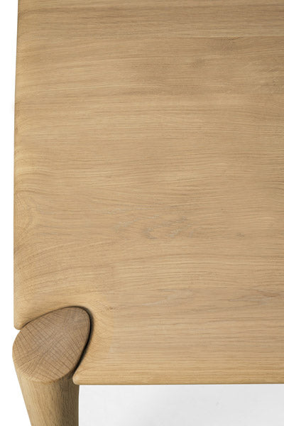PI Dining Table by Ethnicraft, showing closeup view of pi dining table.