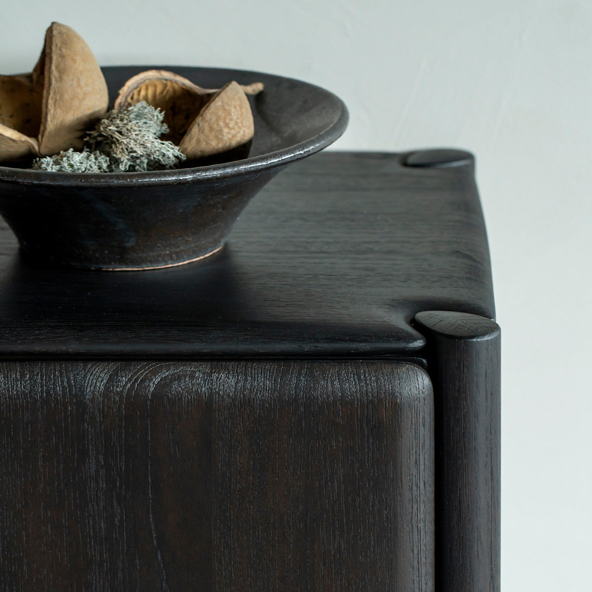 PI Sideboard by Ethnicraft, showing closeup view of pi sideboard in live shot.