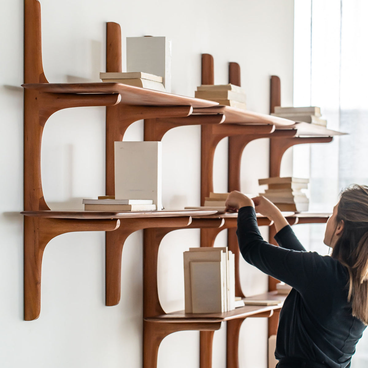 PI Wall Shelf by Ethnicraft, showing pi wall shelf in live shot.