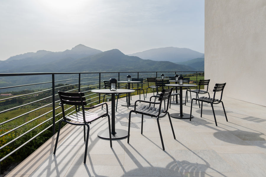 Pico Cafe table by Houe, showing pico cafe tables in live shot.