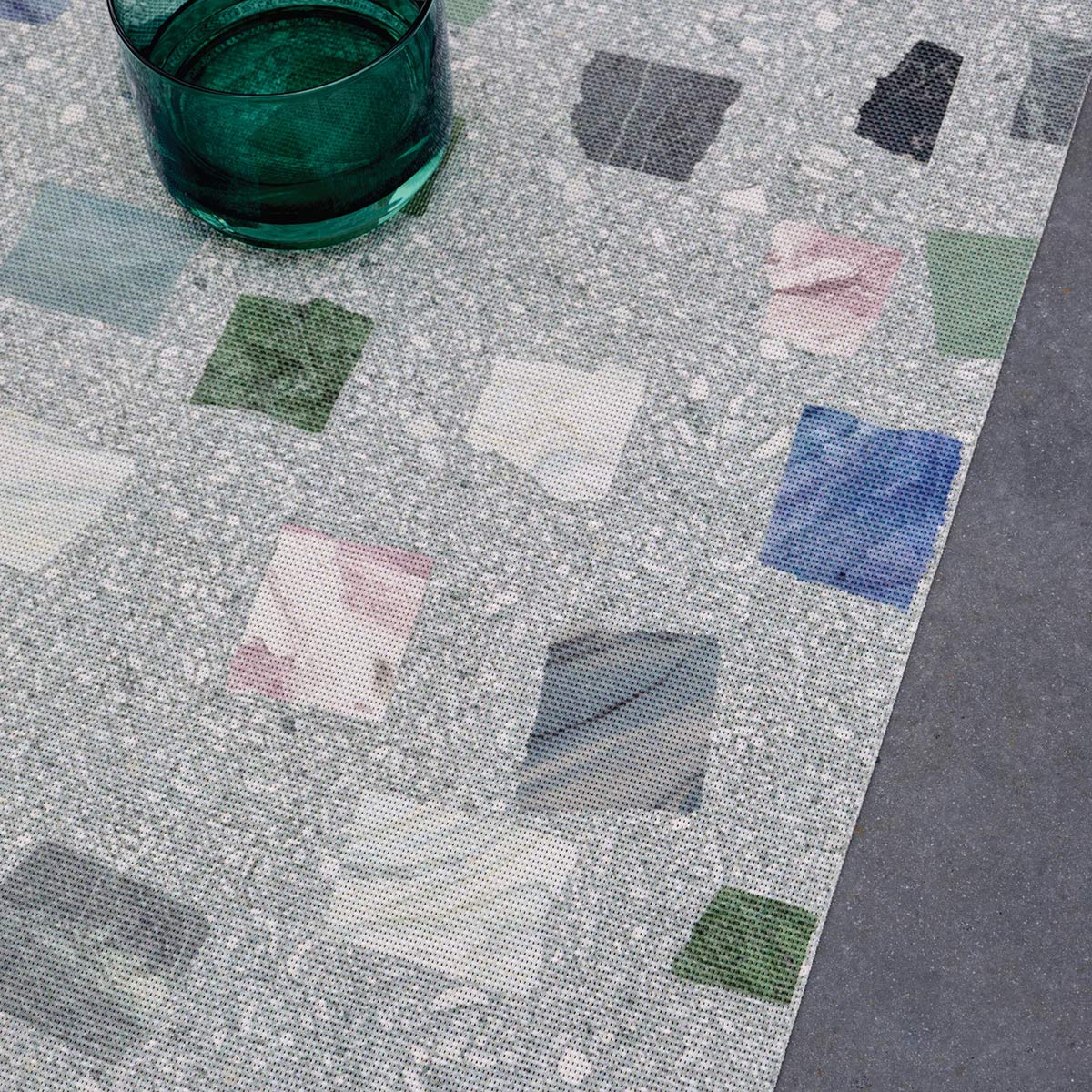 Pietra Placemat by Chilewich, showing closeup view of pietra placemat in live shot.