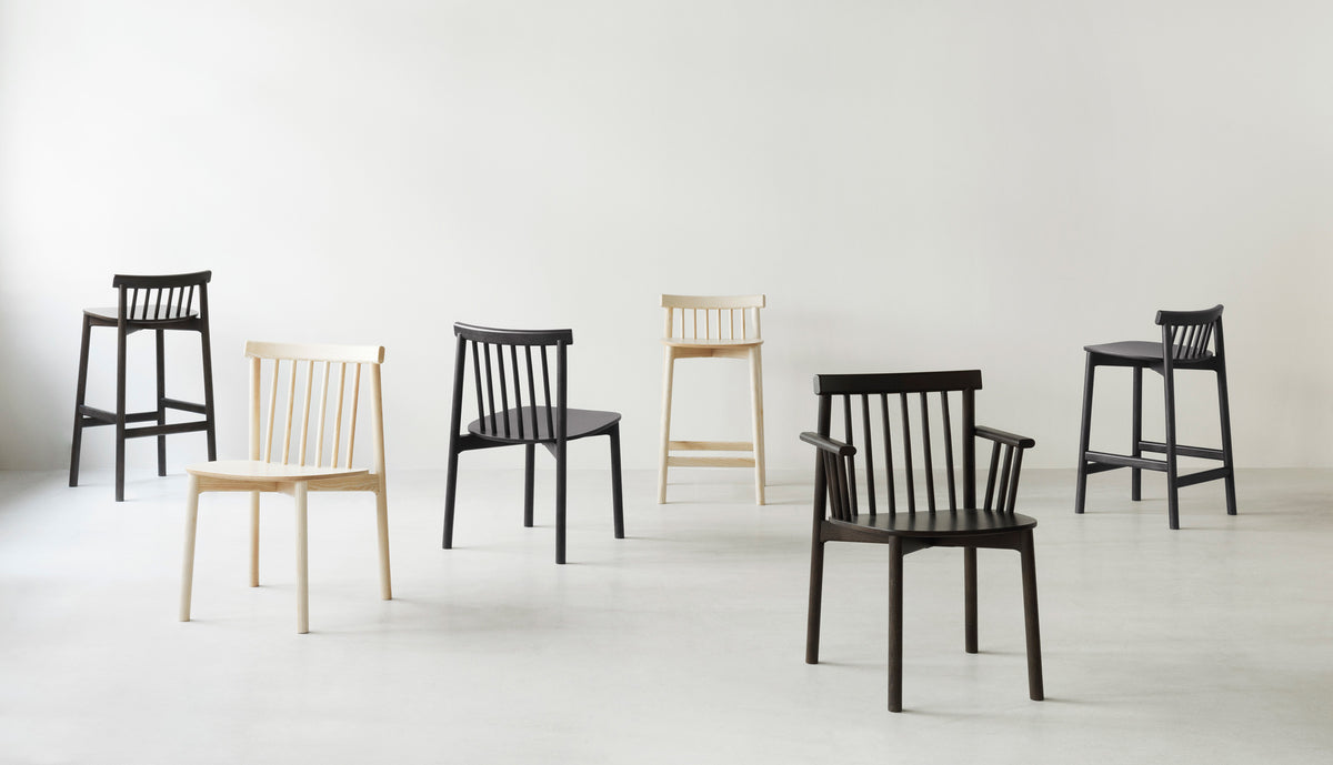 Pind Armchair by Normann Copenhagen, showing pind armchair in live shot.
