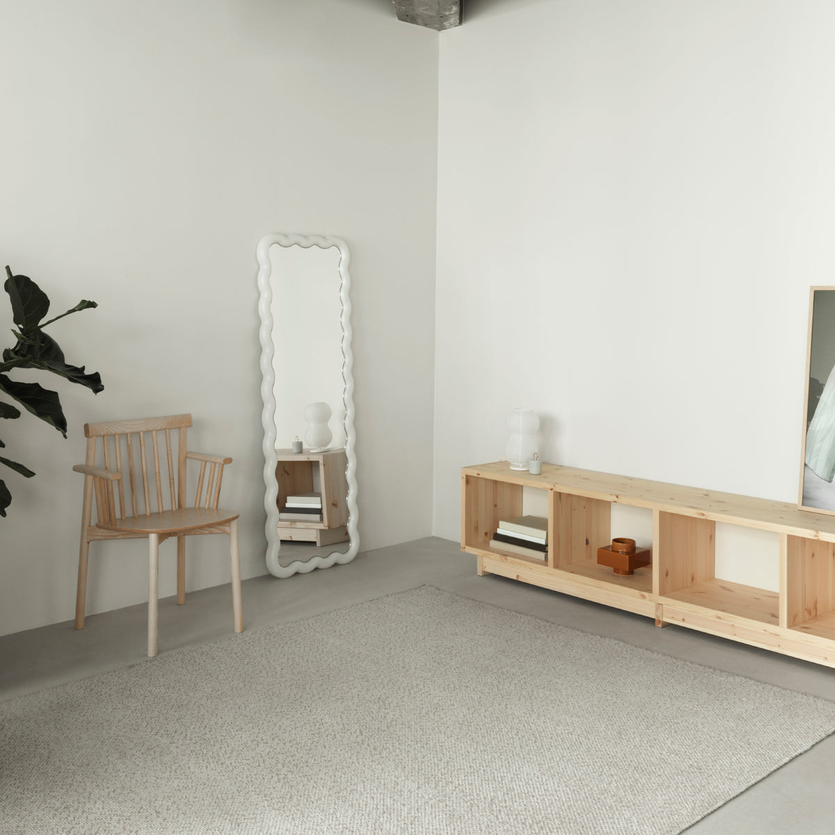 Pind Armchair by Normann Copenhagen, showing pind armchair in live shot.