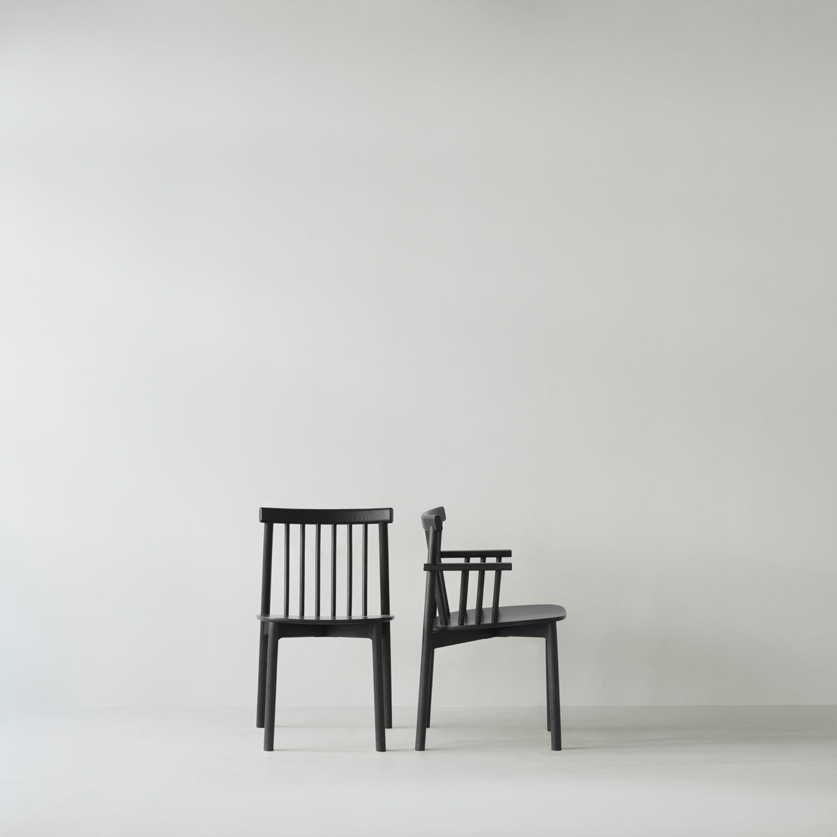 Pind Armchair by Normann Copenhagen, showing pind armchair in live shot.