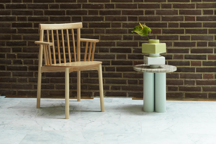 Pind Armchair by Normann Copenhagen, showing pind armchair in live shot.