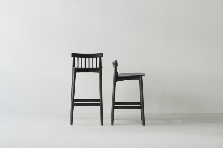 Pind Barstool by Normann Copenhagen, showing pind barstools in live shot.