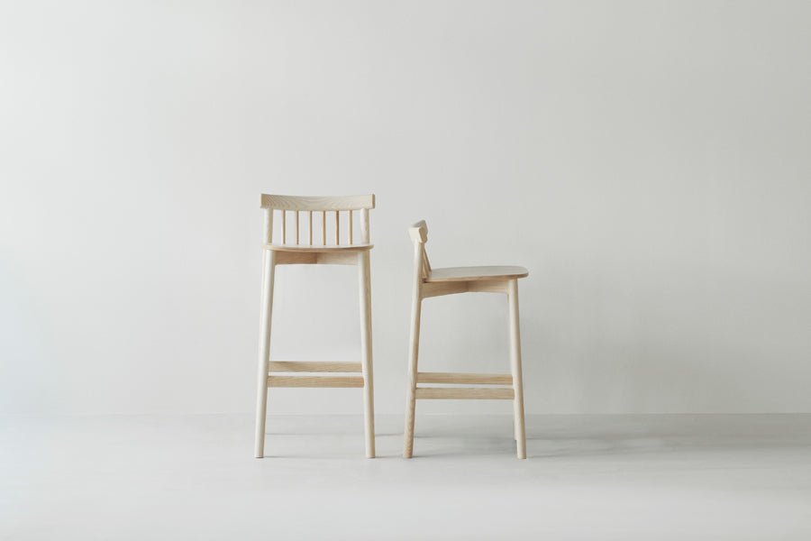 Pind Barstool by Normann Copenhagen, showing pind barstools in live shot.