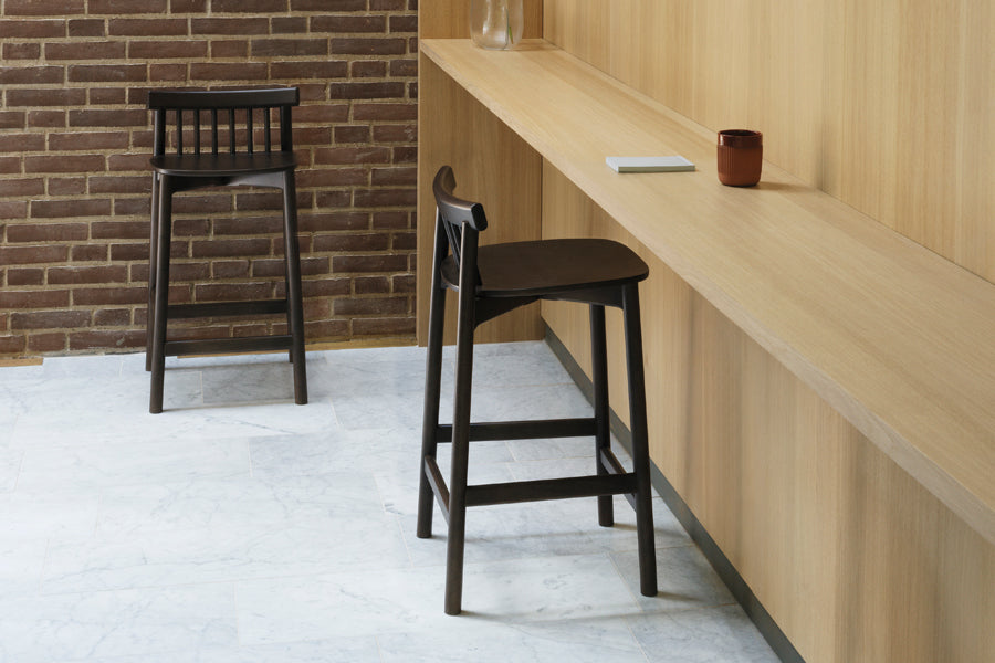 Pind Barstool by Normann Copenhagen, showing pind barstools in live shot.