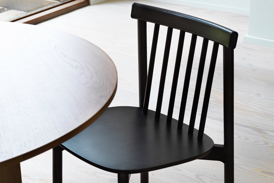 Pind Chair by Normann Copenhagen, showing closeup view of pind chair in live shot.