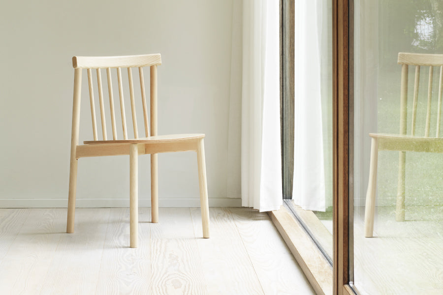 Pind Chair by Normann Copenhagen, showing pind chair in live shot.