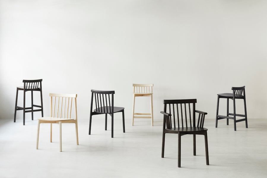 Pind Chair by Normann Copenhagen, showing pind chairs in live shot.
