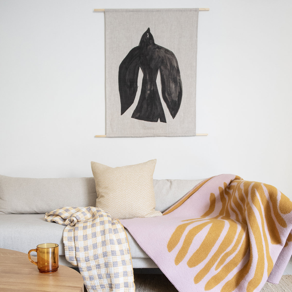 Pine Wool Blanket by Brita, showing pine wool blanket in live shot.