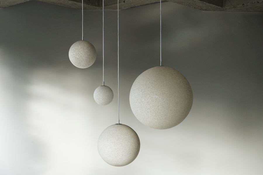 Pix Pendant Lamp by Normann Copenhagen, showing pix pendants lamp in live shot.