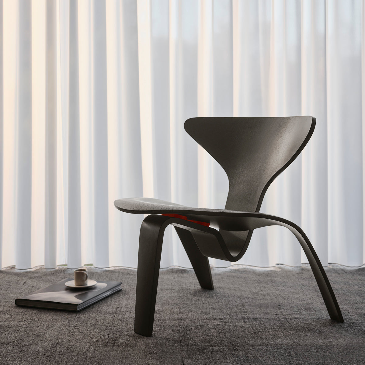 PK0 A Lounge Chair by Fritz Hansen, showing pk0 a lounge chair in live shot.